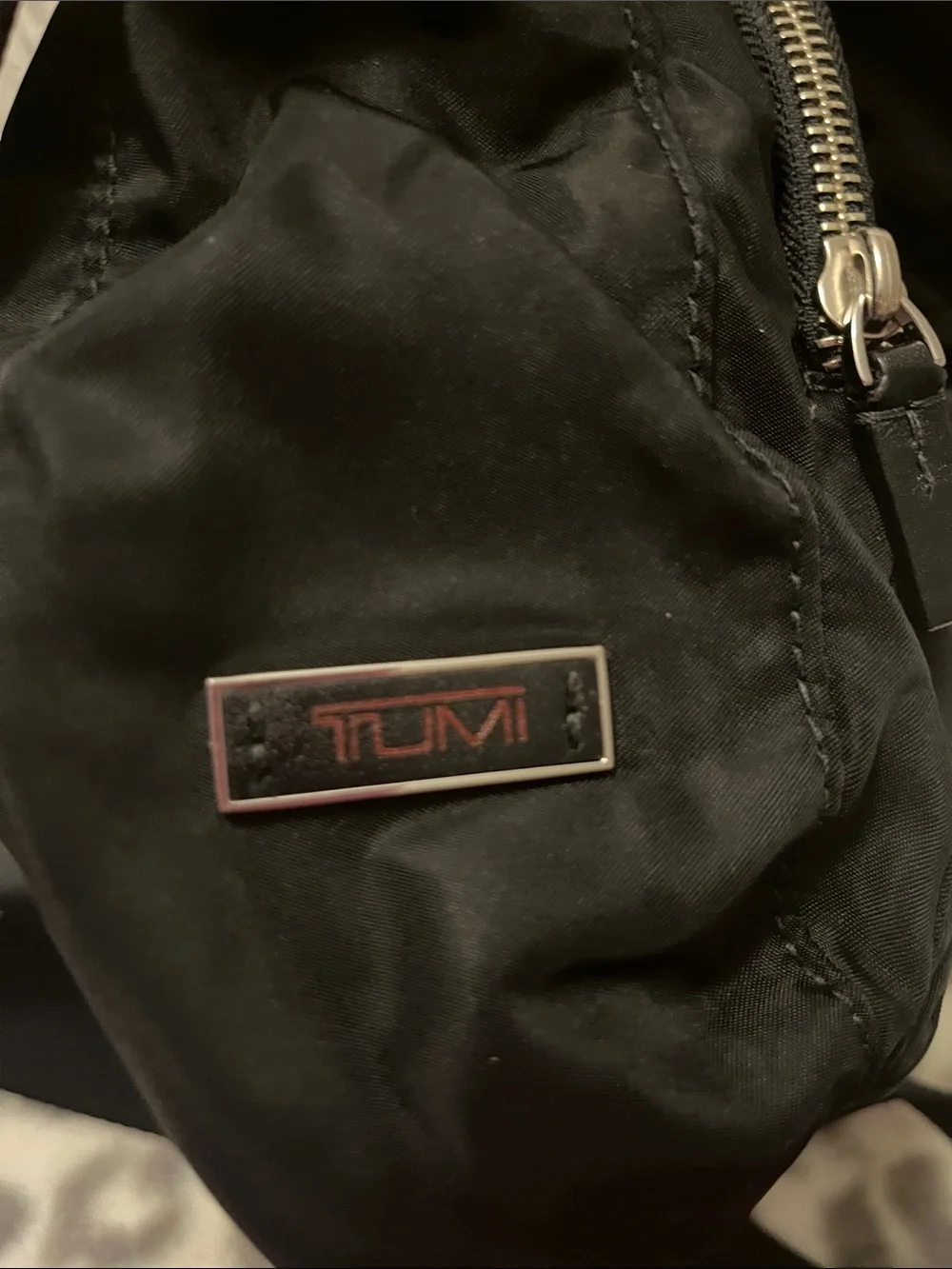 Tumi Black Nylon Crossbody Bag with Red Accent
